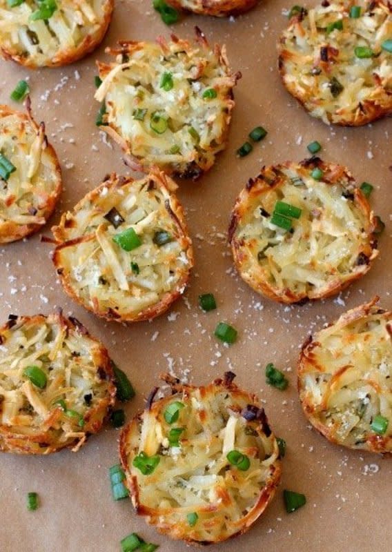 Mantitlement<p>Make these parmesan hash brown cups as a fun side dish for lunch that everyone is going to love!</p><p><strong>Get the recipe: <a href="https://www.mantitlement.com/parmesan-hash-brown-cups/" rel="sponsored" target="_blank" data-ylk="slk:Parmesan Hash Brown Cups;elm:context_link;itc:0;sec:content-canvas" class="link "><em>Parmesan Hash Brown Cups</em></a></strong></p>
