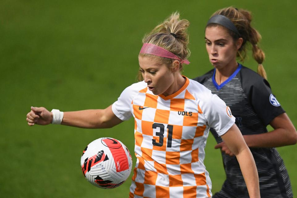 Tennessee forward Mackenzie George (31) tries to keeo the ball from Kentucky defender Caroline Trout (18) in the NCAA women's soccer match between the Tennessee Lady Vols and Kentucky Wildcats in Knoxville, Tenn. on Thursday, October 28, 2021.