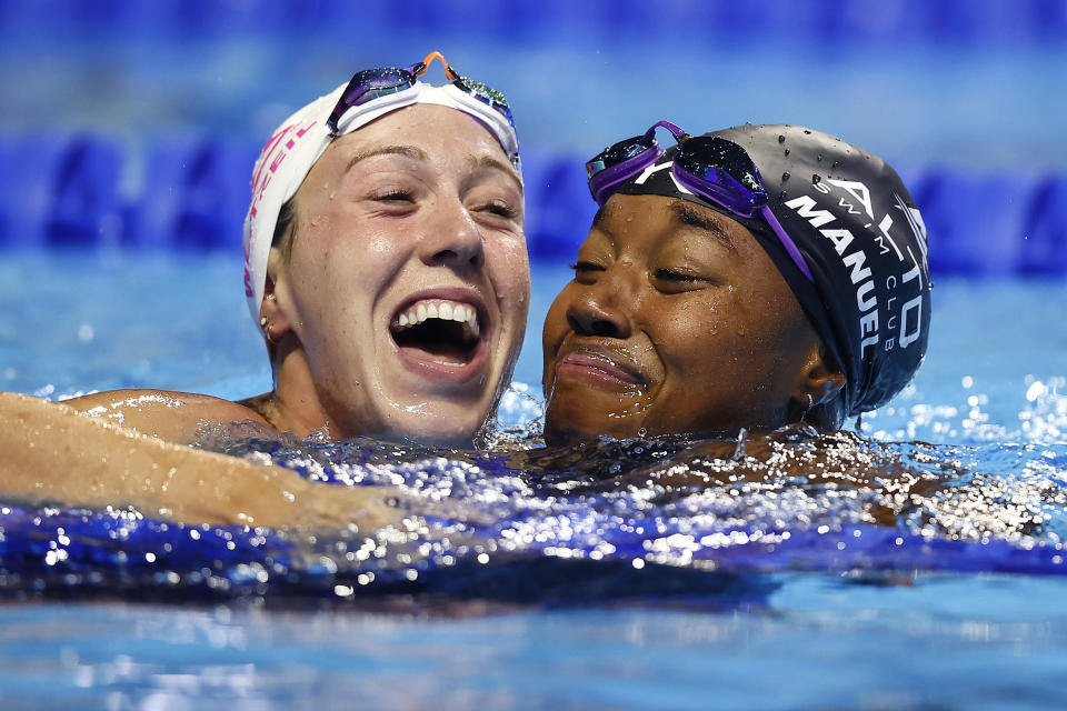 OMAHA, NEBRASKA - JUNE 20: Abbey Weitzeil and Simone Manuel of the United States react after competing in the Women&#39;s 50m freestyle final during Day Eight of the 2021 U.S. Olympic Team Swimming Trials at CHI Health Center on June 20, 2021 in Omaha, Nebraska. (Photo by Tom Pennington/Getty Images)