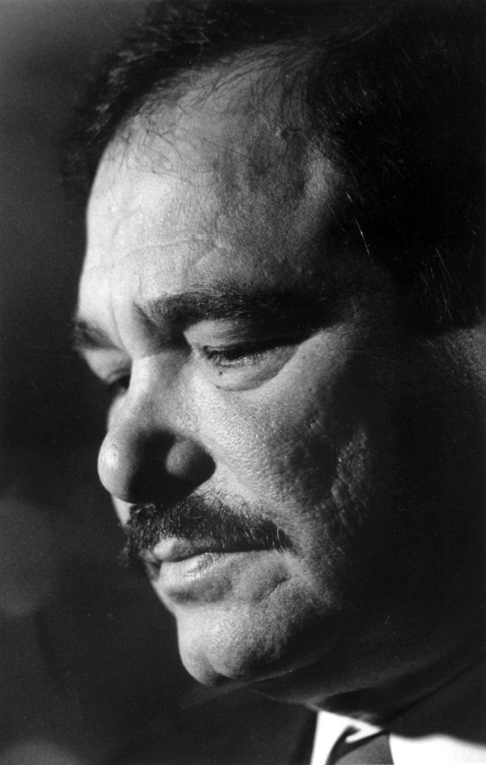 Raul Yzaguirre announces findings of the task force he headed for the Smithsonian on Latino issues in 1994. (Bill O'Leary / The Washington Post via Getty Images file)