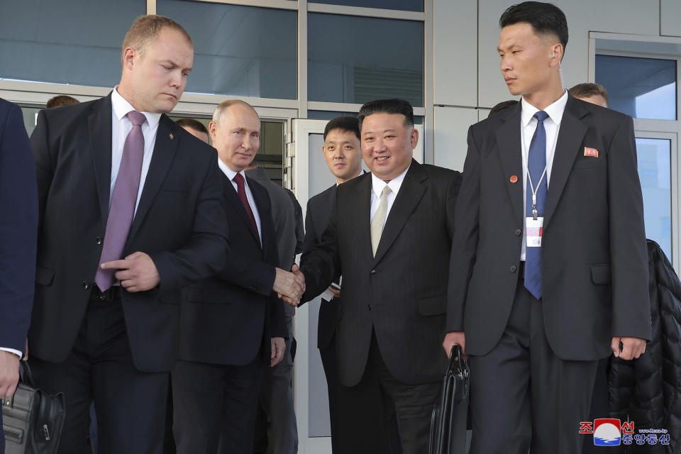 In this photo provided by the North Korean government, North Korean leader Kim Jong Un, center right, bids farewell to Russian President Vladimir Putin as they depart from the Vostochny cosmodrome outside the city of Tsiolkovsky, about 200 kilometers (125 miles) from the city of Blagoveshchensk in the far eastern Amur region, Russia, Wednesday, Sept. 13, 2023. Independent journalists were not given access to cover the event depicted in this image distributed by the North Korean government. The content of this image is as provided and cannot be independently verified. Korean language watermark on image as provided by source reads: "KCNA" which is the abbreviation for Korean Central News Agency. (Korean Central News Agency/Korea News Service via AP)