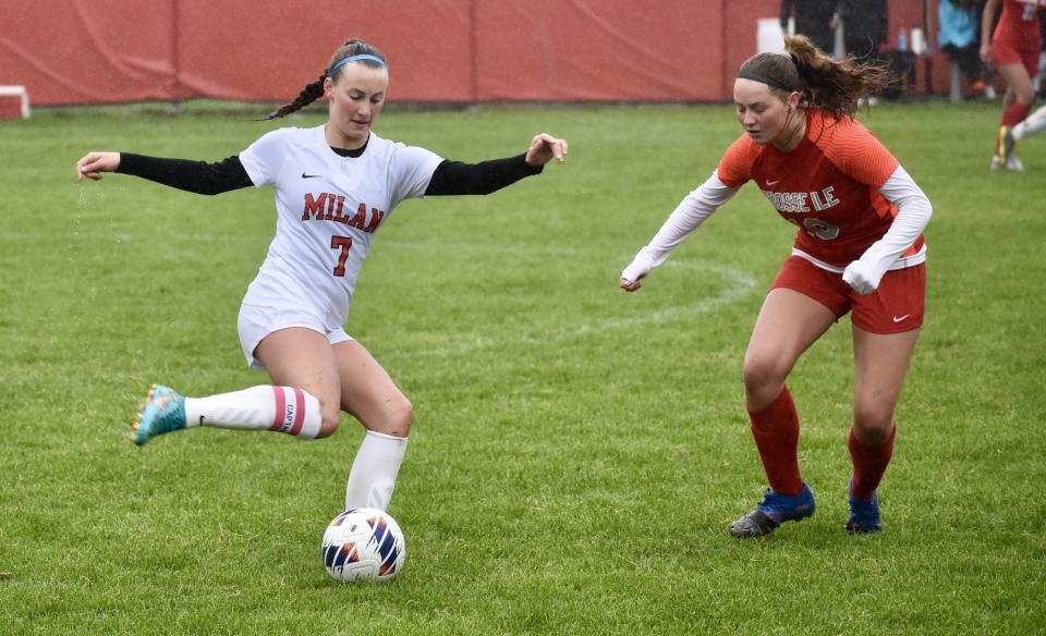 Sylvia Koch moves the ball for Milan during a win over Grosse Ile. She has been named Monroe County Region Girls Soccer Player of the Year.