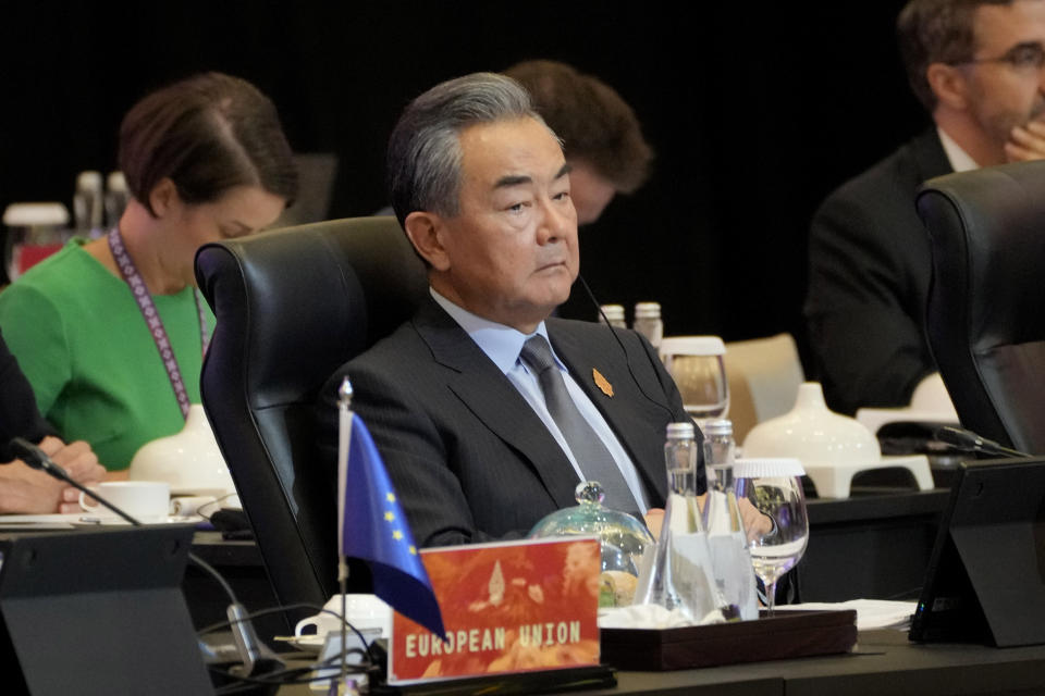 Chinese Foreign Minister Wang Yi attends the opening session of the G20 Foreign Ministers' Meeting in Nusa Dua, Bali, Indonesia, Friday, July 8, 2022. (AP Photo/Dita Alangkara, Pool)