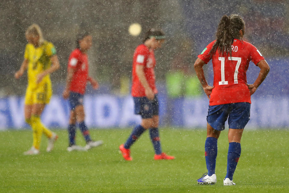 Severe weather, including lightning strikes, suspended Tuesday's match between Chile and Sweden. (Photo by Richard Heathcote/Getty Images)