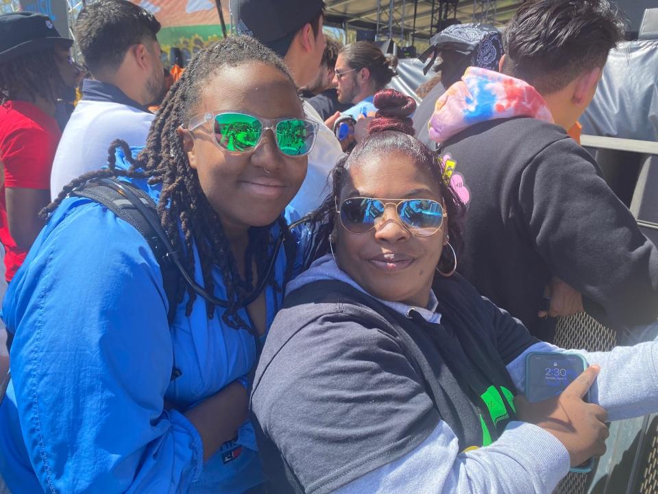 Jaden Towe, 17, and Kreshunda Casteal, 23, attend the Dreamville Festival on Sunday, April 3, 2022, in Raleigh.