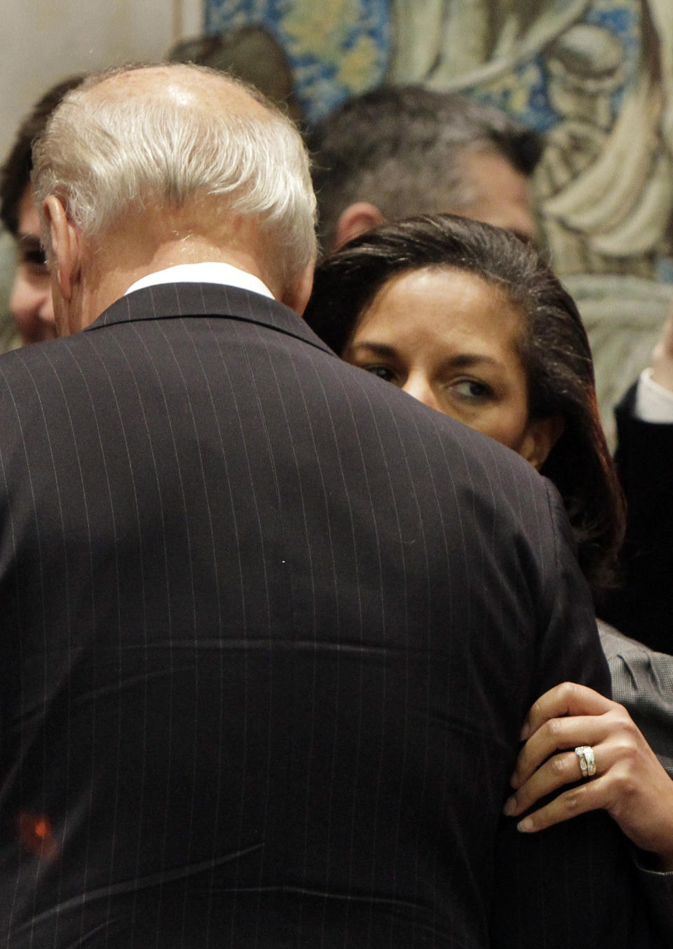 FILE - In this Dec. 15, 2010, file photo Susan Rice, the U.S. ambassador to the United Nations, whispers in the ear of Vice President Joe Biden in the United Nations Security Council, at U.N. headquarters. Democratic presidential nominee Joe Biden is in the final stages of selecting his running mate. Among the contenders is Susan Rice, who worked closely with Biden in the Obama administration and regularly briefed him on pressing foreign policy matters when she served as national security adviser. (AP Photo, File)