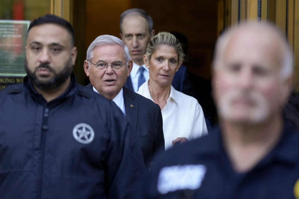 Sen. Bob Menendez and his wife, Nadine Menendez leave federal court, Wednesday, Sept. 27, 2023, in New York. Menendez pled not guilty to federal charges alleging he used his powerful post to secretly advance Egyptian interests and carry out favors for local businessmen in exchange for bribes of cash and gold bars.(AP Photo/Seth Wenig)