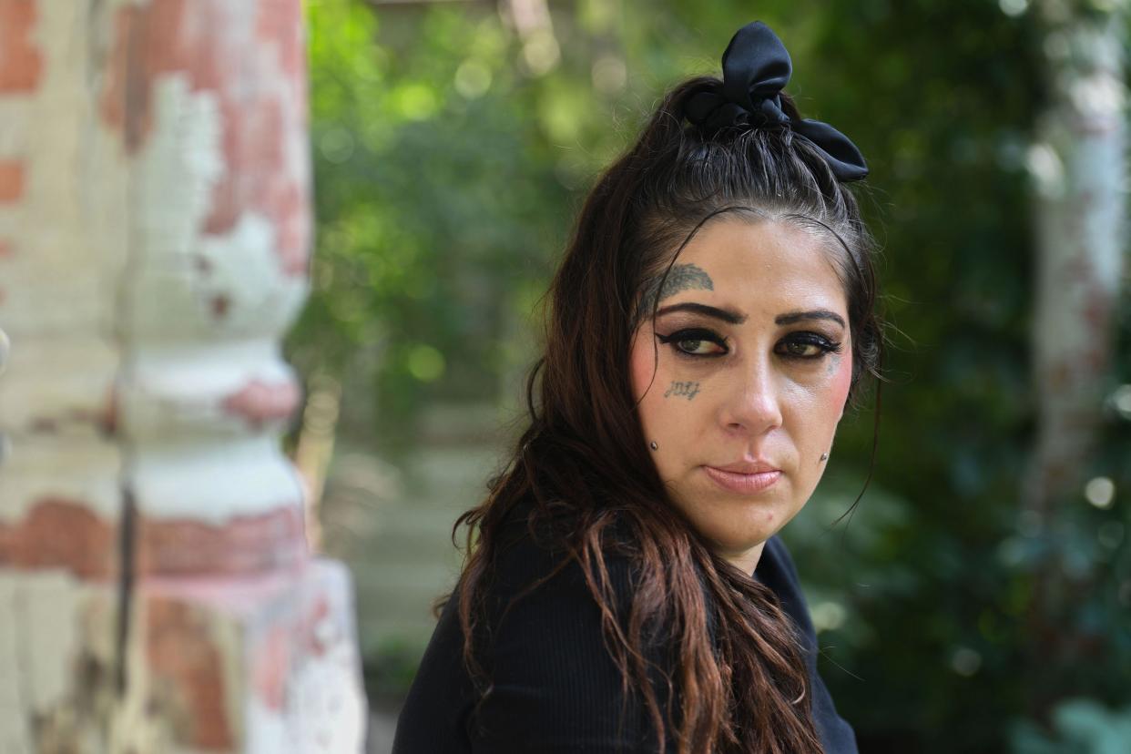 Christian Banley sits in front of her Aberdeen home on Wednesday, Aug. 23, 2023. Banley’s parental rights for two daughters were terminated earlier in the summer