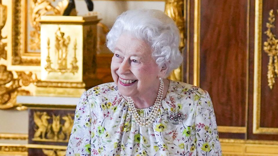 Queen Elizabeth II arrives to view a display of artefacts from British craftwork company, Halcyon Days