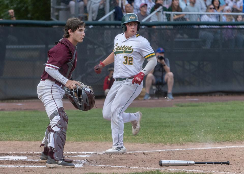 DBP catcher Gabe Cushner awaits the throw as RBC runner Frank Scrivanic nears home plate. Don Bosco Prep baseball defeats Red Bank Catholic in NJSIAA Non-Public A final in Hamilton NJ on June 9, 2023.