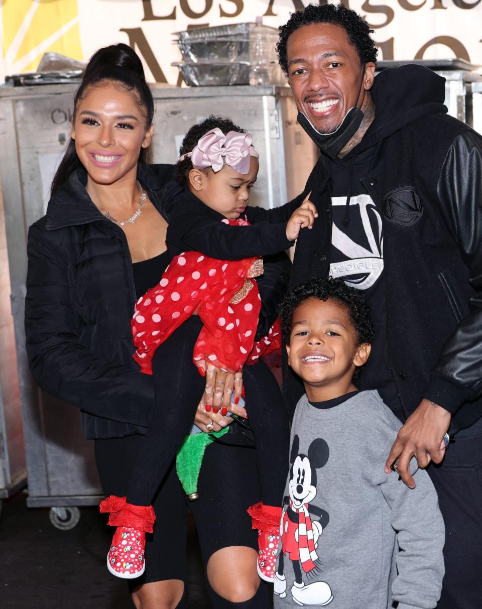 LOS ANGELES, CALIFORNIA - DECEMBER 23: Brittany Bell, Nick Cannon and children Powerful Queen Cannon and Golden Cannon attend the Los Angeles Mission's Annual Christmas Celebration at the Los Angeles Mission on December 23, 2022 in Los Angeles, California. (Photo by David Livingston/Getty Images)