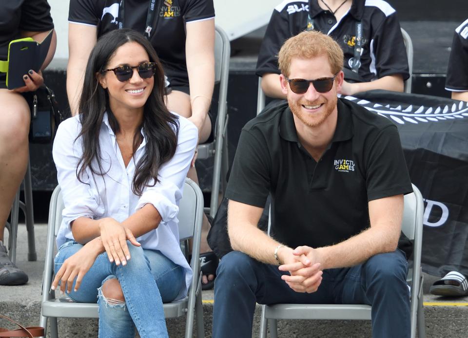 Meghan Markle wearing a Misha Nonoo shirt during her first public outing with Prince Harry back in 2017