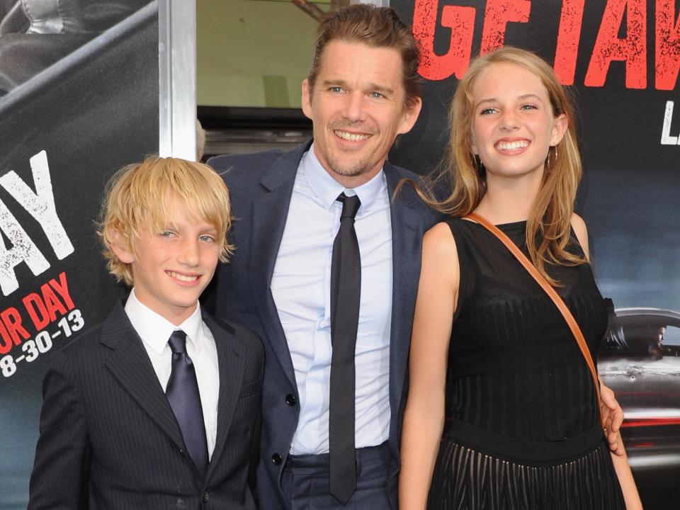 Ethan Hawke and son Roan Thurman-Hawke (L) and daughter Maya Thurman-Hawke (R) arrive at the Los Angeles Premiere "Getaway" at Regency Village Theatre on August 26, 2013 in Westwood, California