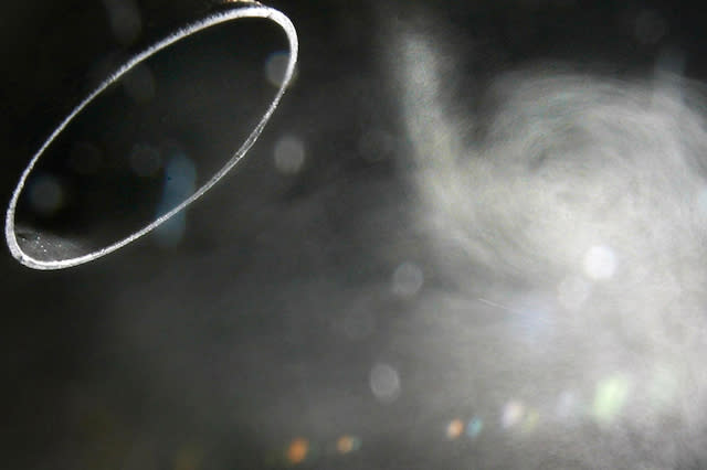 File photo dated 02/02/07 of a car exhaust. Parents who leave their car engines running while on the school run should face fines as part of a drive to cut air pollution, new guidance suggests.