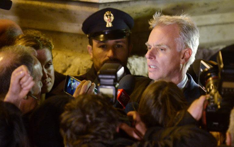 Amanda Knox's lawyer Carlo Dalla Vedova talks to journalists as he leaves Italy's highest court building, in Rome, on March 27, 2015