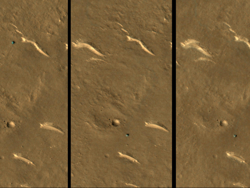 China's Martian rover sits unmoving next to a crater on Mars