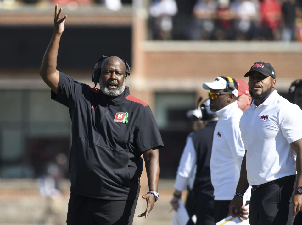 Maryland coach Mike Locksley, left, gestures during the first half of the team's NCAA football game against Towson on Saturday, Sept. 2, 2023, in College Park, Md. (AP Photo/Steve Ruark)