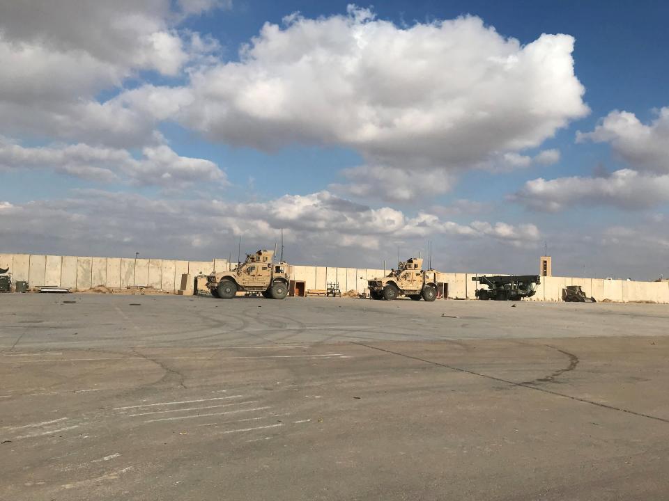 Military vehicles of U.S. soldiers are seen at Ain al-Asad air base in Anbar province (REUTERS)