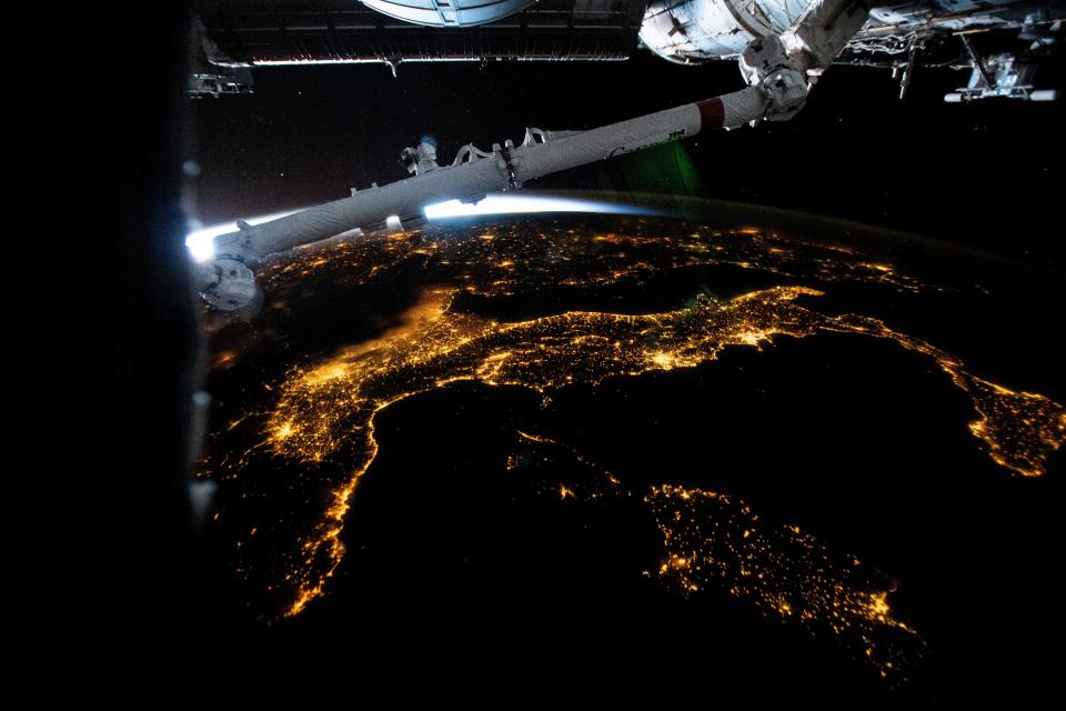 The city lights of Italy, including the French island of Corse and Italian islands of Sardinia and Sicily, are pictured from the International Space Station.