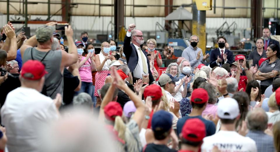 Derrick Van Orden, a Trump supporter who attended the president's Jan. 6 rally in Washington, D.C., is shown here during a 2020 campaign event with then-Vice President Mike Pence. Van Orden attended a Pence visit to Tankcraft Corp. in Darien on Aug. 19, 2020. Van Orden was running for Congress at the time and is a leading Republican campaigning again in Wisconsin's 3rd Congressional District.