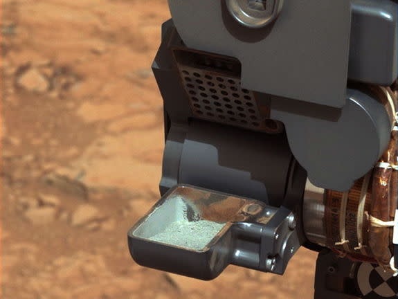 This image from NASA's Curiosity rover shows the first sample of powdered rock extracted by the rover's drill. The image was obtained by Curiosity's Mast Camera on Feb. 20, or Sol 193, Curiosity's 193rd Martian day of operations.