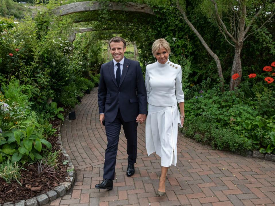 Brigitte Macron with her husband, Emmanuel (AP)