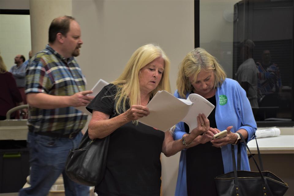Williamson County Commission District 2 incumbents and 2022 Republican primary winners Judy Herbert and Betsy Hester view the last set of tallies received by the election commission office on May 3, 2022, in Franklin, Tenn.