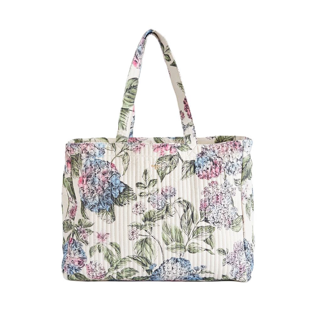 <p><a href="https://go.redirectingat.com?id=74968X1596630&url=https%3A%2F%2Fus.fableengland.com%2Fproducts%2Fquilted-cotton-tote-hydrangea%3Fvariant%3D43537321951490%26currency%3DUSD%26gclid%3DCj0KCQjw5f2lBhCkARIsAHeTvlirhvNiLlAYIDqJEuS_Sm-e8ftDUtqrpPT-X0yPZawXok4fp4DiChEaAijcEALw_wcB&sref=https%3A%2F%2Fwww.elle.com%2Ffashion%2Fshopping%2Fg44640132%2Fbest-quilted-tote-bags%2F" rel="nofollow noopener" target="_blank" data-ylk="slk:Shop Now;elm:context_link;itc:0;sec:content-canvas" class="link rapid-noclick-resp">Shop Now</a></p><p>Quilted Cotton Tote Hydrangea</p><p>$104.00</p><p>fableengland.com</p><span class="copyright">Courtesy</span>