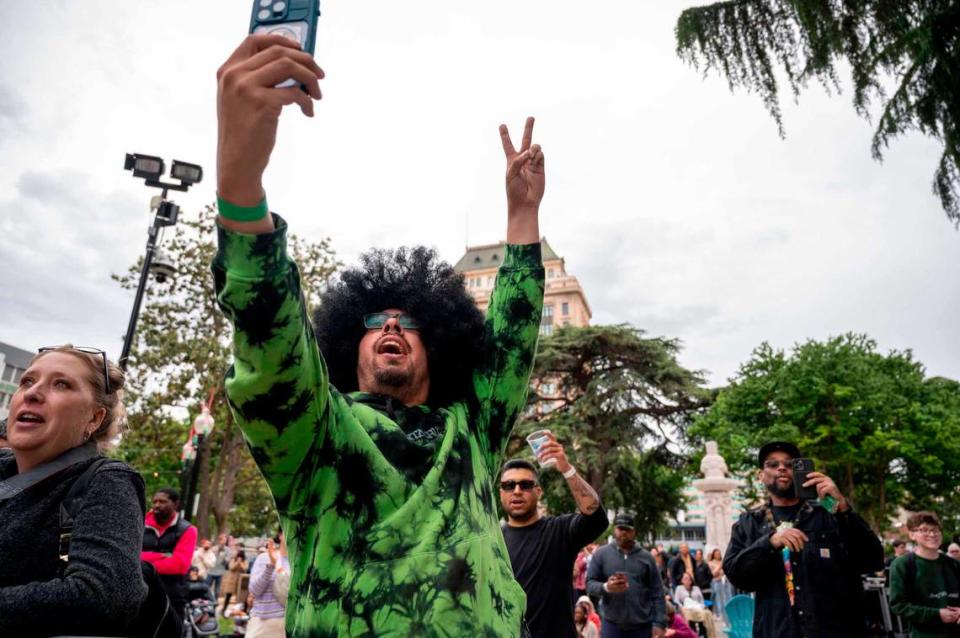 Martin Ortiz takes a selfie at the opening night of the Concerts in the Park series on Cinco de Mayo at Cesar Chavez Plaza.