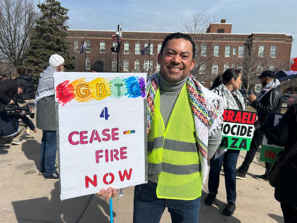 Mike Flores, 43 of Hazel Park, attends a Feb. 25, 2024 rally in Zussman Park in Hamtramck to mobilize voters to select "uncommitted" in Michigan's Democratic presidential primary instead of President Joe Biden.