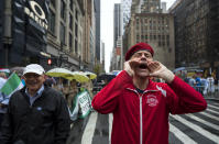 <p>Curtis Sliwa, right, founder of the Guardian Angels, yells toward New York Mayor Bill de Blasio during the annual Columbus Day Parade in New York, Monday, Oct. 9, 2017. (Photo: Craig Ruttle/AP) </p>