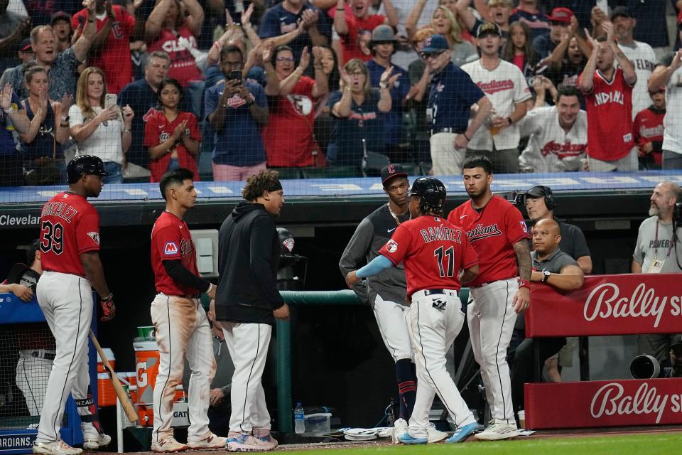 Guardians third baseman Jose Ramirez (11) is cheered as he walks off the field following an altercation with White Sox shortstop Tim Anderson in the sixth inning Saturday.