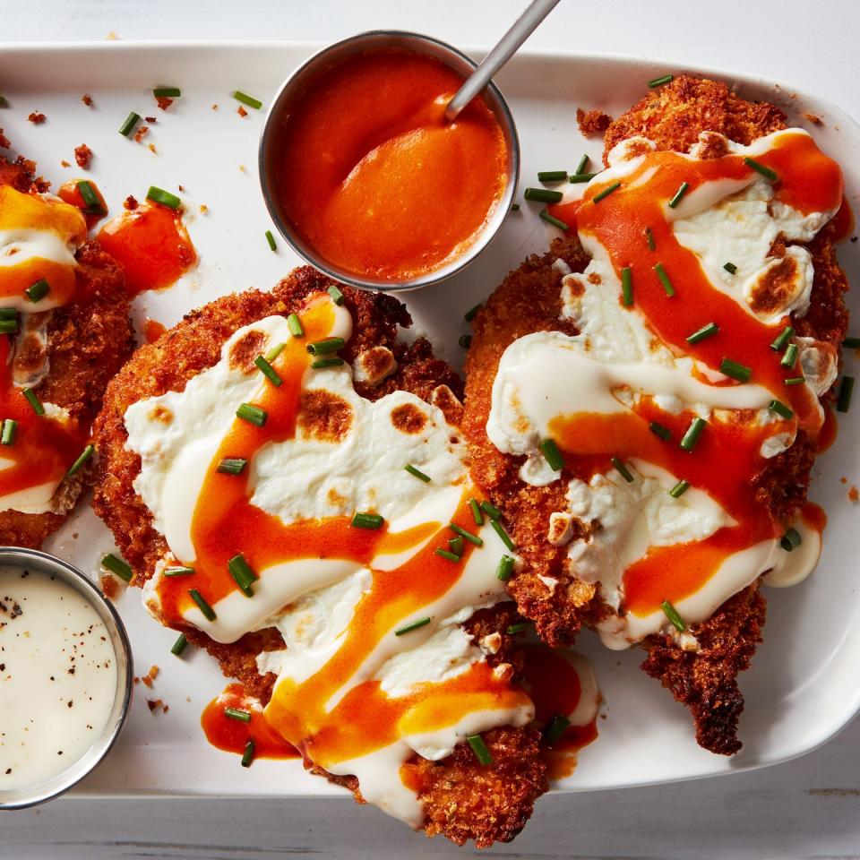 crispy chicken pieces covered in mozzarella and buffalo sauce