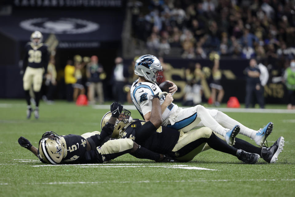 New Orleans Saints defensive end Cameron Jordan sacks Carolina Panthers quarterback Sam Darnold in the second half of an NFL football game in New Orleans, Sunday, Jan. 2, 2022. The Saints won 18-10. (AP Photo/Derick Hingle)