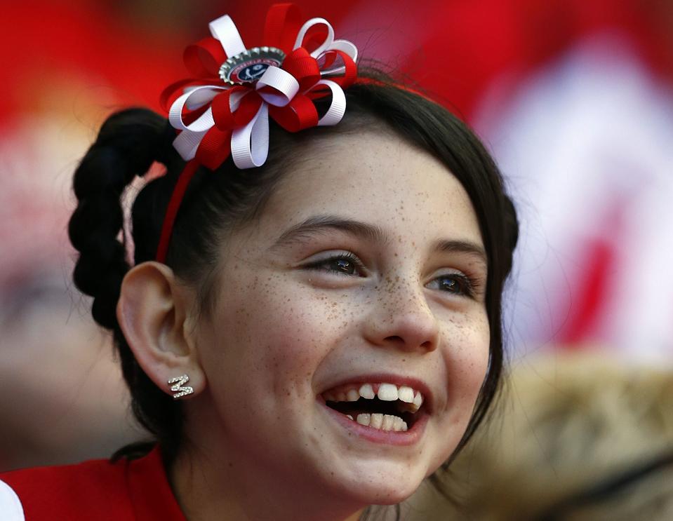 A Sheffield United fan smiles before their English FA Cup semi-final soccer match against Hull City at Wembley Stadium in London, April 13, 2014. REUTERS/Darren Staples (BRITAIN - Tags: SPORT SOCCER)