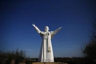 A monument of the late Pope John Paul II stands in Czestochowa, southern Poland April 2, 2014. REUTERS/Kacper Pempel