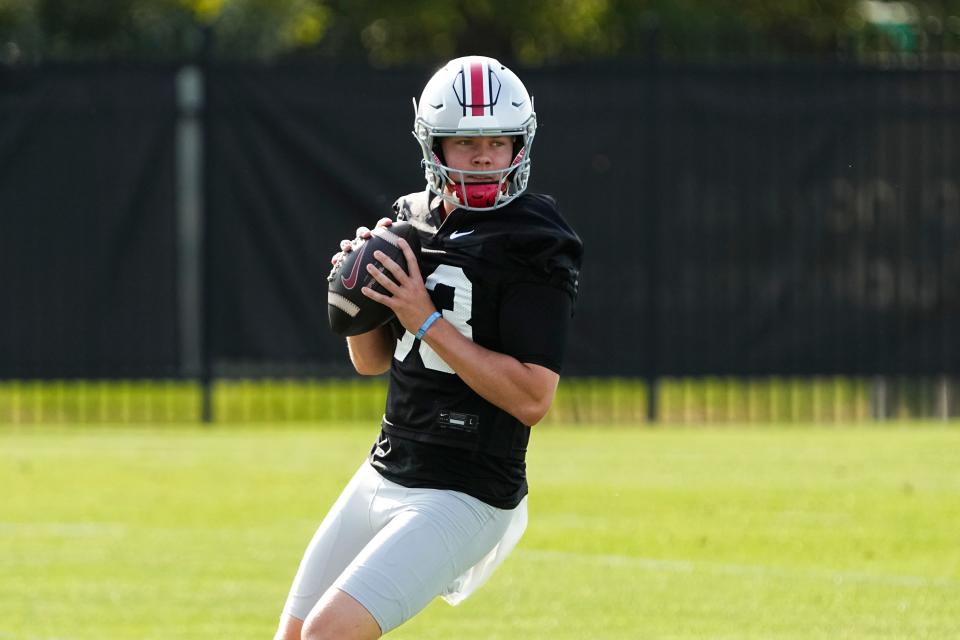 Aug 1, 2024; Columbus, OH, USA; Ohio State Buckeyes quarterback Devin Brown (33) drops back to pass during football camp at the Woody Hayes Athletic Complex.