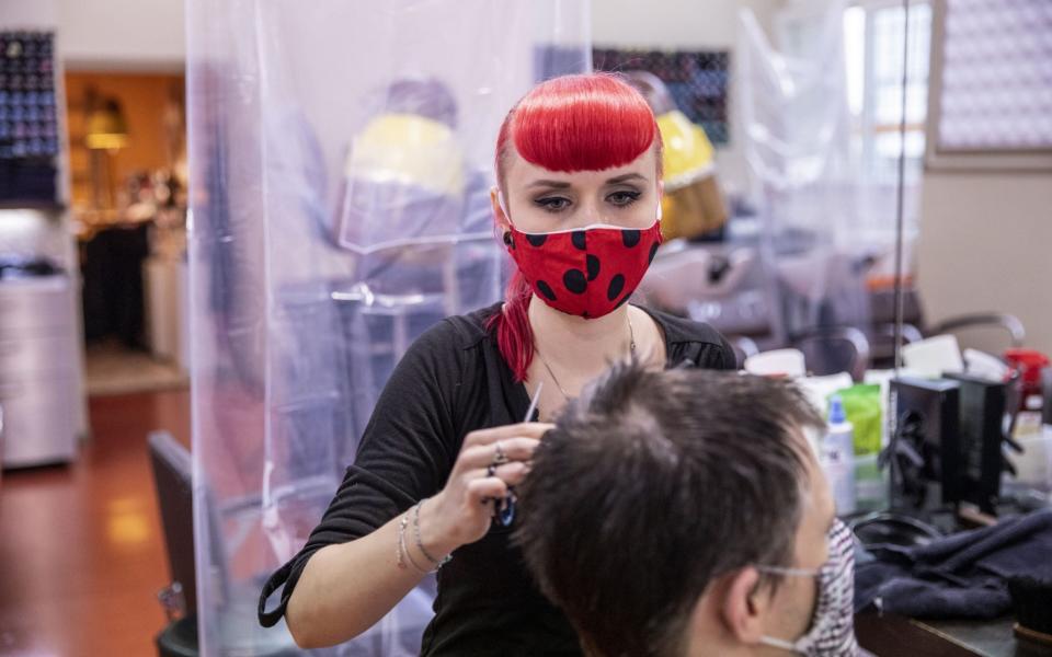 Small businesses such as hairdressers, have reopened in Germany - Maja Hitij/Getty Images Europe