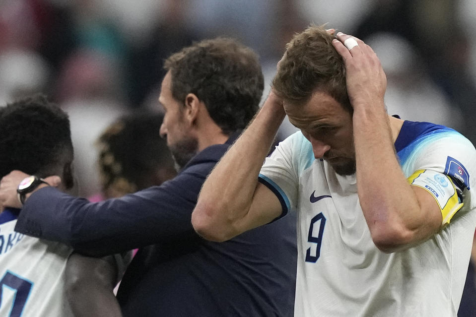 England's Harry Kane reacts after the World Cup quarterfinal soccer match between England and France, at the Al Bayt Stadium in Al Khor, Qatar, Sunday, Dec. 11, 2022. (AP Photo/Frank Augstein)