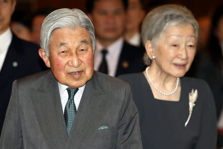 Japanese Emperor Akihito (L) and Empress Michiko (R) arrive for a meeting with family members of Japanese veterans living in Vietnam, at a hotel in Hanoi, Vietnam, March 2, 2017. REUTERS/Minh Hoang/Pool