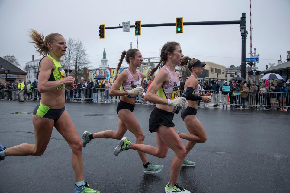 Elite women race down Waverly Street (Route 135) in Framingham, April 17, 2023.