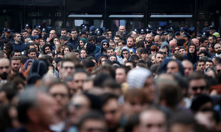 Protesters attend a rally against the Georgian authorities' anti-drug policy following the recent police raids at several local nightclubs near the building of parliament in Tbilisi, Georgia May 12, 2018. REUTERS/David Mdzinarishvili