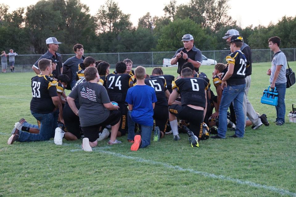 Follett gathers after their victory over Hedley on Thursday, Aug. 25, 2022.