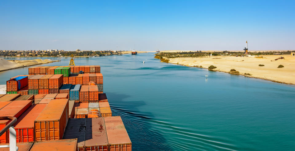 container ship passes through Suez Canal