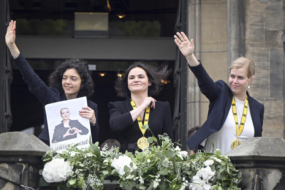 FILE – Belarus opposition leader Svetlana Tsikhanouskaya, center, civil rights activist Veronika Zepkalo, right, also from Belarus, and Tatsiana Khomich, who accepted the Charlemagne Prize on behalf of her sister Maria Kolesnikova (photo), who is imprisoned in Belarus, stand at a peace rally after the award ceremony in Aachen, Germany, on Thursday, May 26, 2022. It's been a year since Kolesnikova last wrote a letter to her family from behind bars, her father says. No one has seen or heard from Kolesnikova, who is serving 11 years in prison for organizing anti-government rallies, since Feb. 12, 2023. (Bernd Thissen/dpa via AP, File)