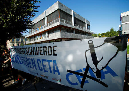 Demonstrators prostest against the Comprehensive Economic and Trade Agreement (CETA) at the Constitutional Court in Karlsruhe, Germany August 31, 2016. REUTERS/Ralph Orlowski