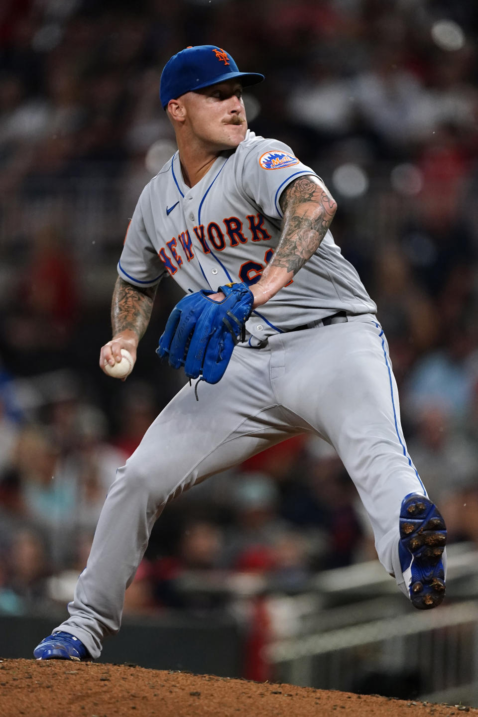 New York Mets relief pitcher Sean Reid-Foley works against the Atlanta Braves during the fourth inning of a baseball game Wednesday, June 30, 2021, in Atlanta. (AP Photo/John Bazemore)