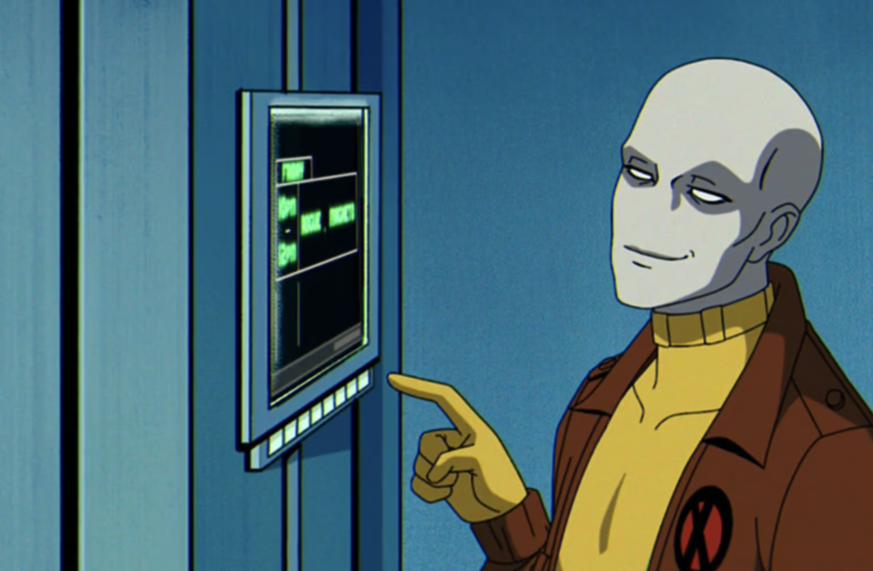 One Punch Man's Saitama in a brown jacket and yellow turtleneck pointing at a computer screen