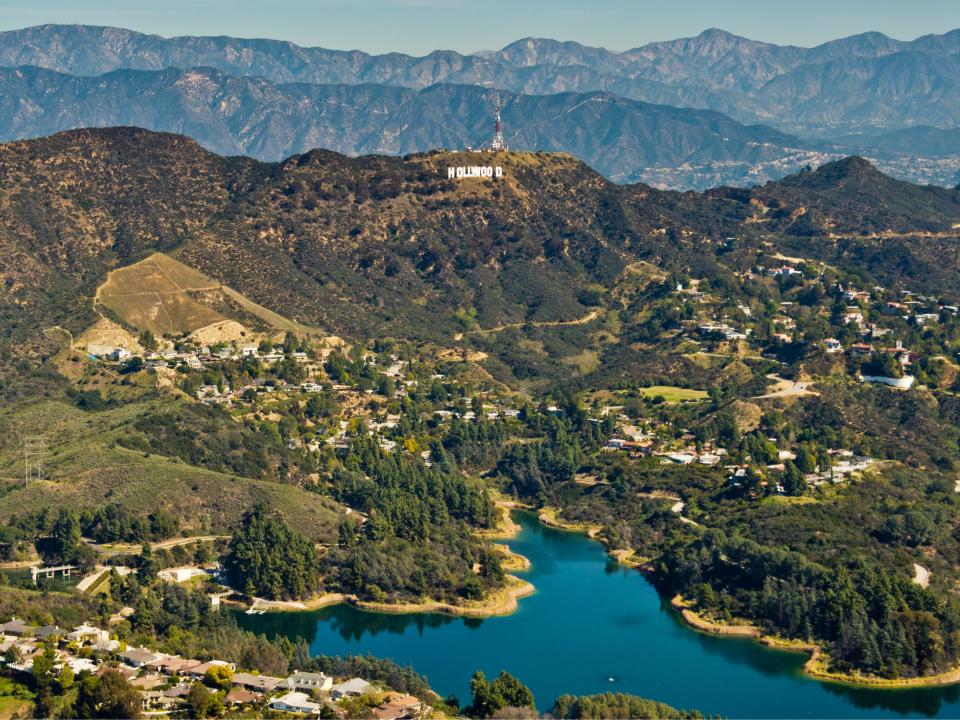 The Hollywood Sign (formerly known as the Hollywoodland Sign) is situated on Mount Lee in the Hollywood Hills area of the Santa Monica Mountains. The sign overlooks the Hollywood district of Los Angeles.