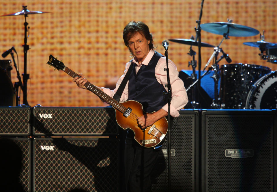 Paul McCartney performs at The Night that Changed America: A Grammy Salute to the Beatles, on Monday, Jan. 27, 2014, in Los Angeles. (Photo by Zach Cordner/Invision/AP)